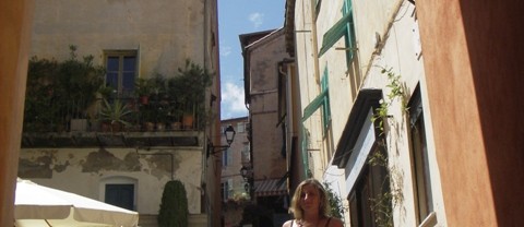 Girl posing on the steps up Villefranche