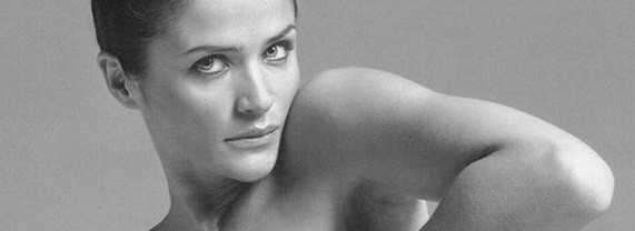 Icon of beauty with brains: Helena Christensen up to neck naked in black and white