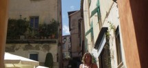 Girl posing on the steps up Villefranche