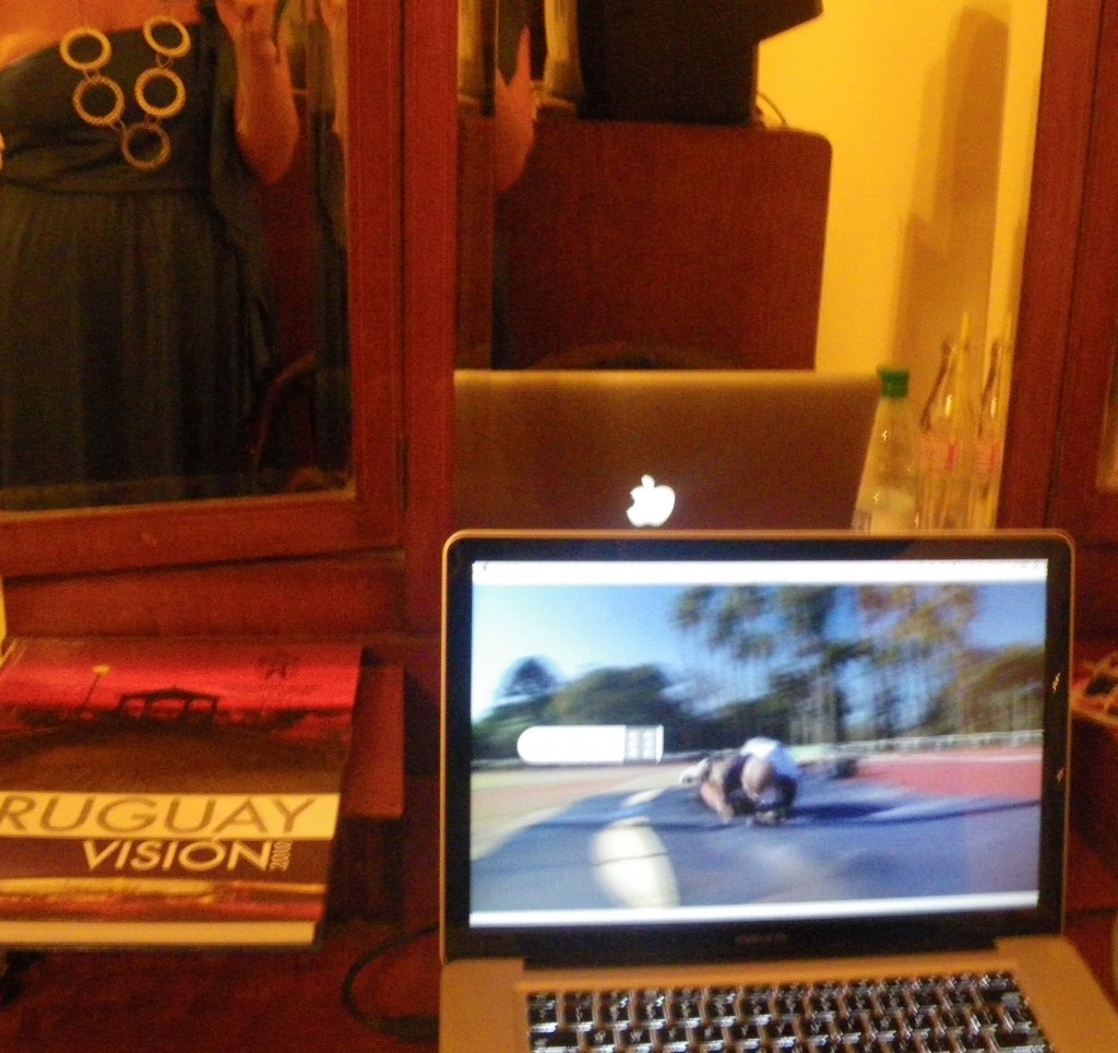 Mac pro screen showing movie scene with girl in mirror