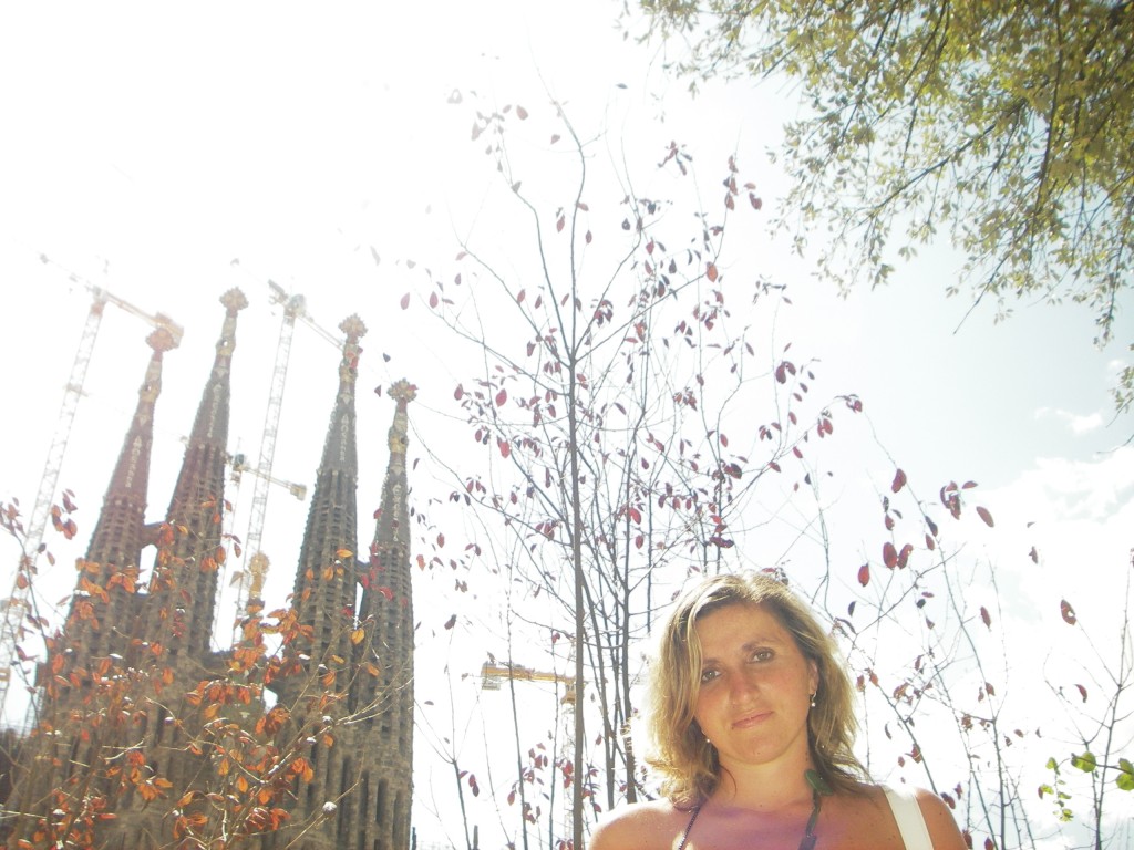 Girl in front of Sagrada Familia cathedral in Barcelona