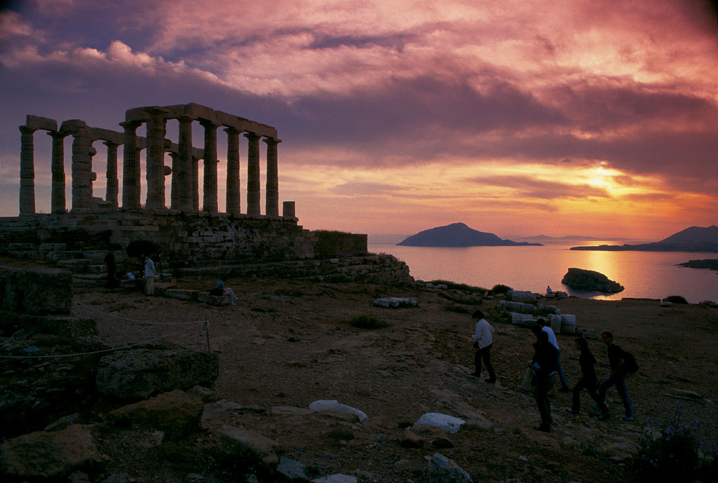The Poseidon temple in Athens, up on a cliff at sunset
