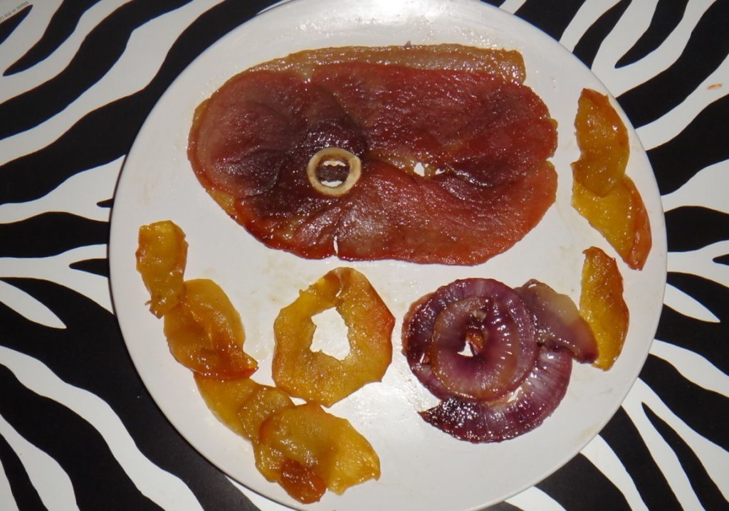 Bringing Kentucky home: honey bourbon glazed Kentucky old-fashioned ham with baked red onions and red apples